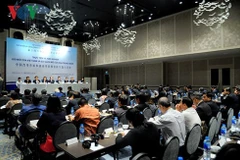 Intercambian experiencias en conferencia teórica entre Partidos Comunistas de Vietnam y China