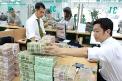 Mercado monetario de Vietnam sufre leves impactos de elevación de tasa de interés del FED