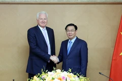 Proponen a grupo singapurense intercambiar experiencias con Vietnam en banco digital