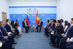 El primer ministro de Vietnam, Pham Minh Chinh, y el presidente de Venezuela, Nicolás Maduro. (Foto: VNA)