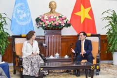 Canciller vietnamita recibe a directora general de UNESCO 