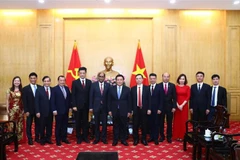 Profundizan cooperación entre Academia Nacional de Política Ho Chi Minh y socios singapurenses