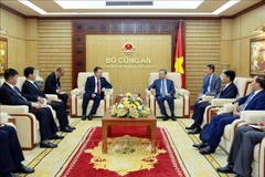 Ministro vietnamita recibe a delegación de Policía Armada Popular de China