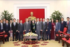 Comisiones Partidistas de Vietnam y Laos fortalecen cooperación