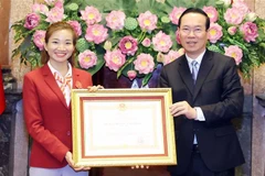 Presidente vietnamita se reúne con atletas destacados en SEA Games 32