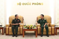 Ministerios de Defensa de Vietnam y Laos agilizan lazos en información