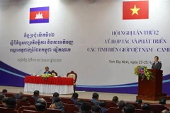 Efectúan XII Conferencia sobre cooperación de provincias fronterizas Vietnam-Camboya