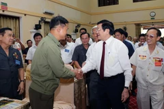 El presidente vietnamita, Truong Tan Sang, reunió con excombatientes en Nghe An (Fuente: VNA)