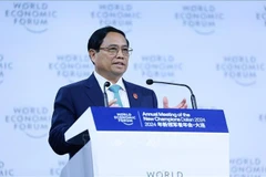 El primer ministro vietnamita, Pham Minh Chinh, habla en el evento. (Fuente:VNA)