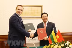 Firman Vietnam y Lituania acuerdo de exención del visado para diplomáticos