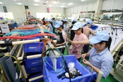 Analizan avance del cambio de modelo de crecimiento en Vietnam