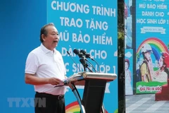 Impulsa Vietnam uso de cascos para niños por seguridad vial