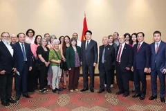 El presidente vietnamita Luong Cuong y los delegados (Fuente: VNA)