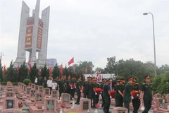 Rinden homenaje a combatientes voluntarios vietnamitas fallecidos en Laos