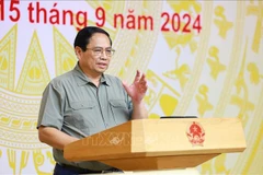 El primer ministro Pham Minh Chinh preside una conferencia en línea de miembros permanentes del Gobierno con representantes de las localidades afectadas por la tormenta Yagi (Fuente: VNA)