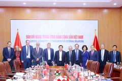 Los delegados del Partido Comunista de Vietnam y el Partido Comunista Francés (Fuente: VNA)