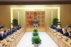 En el encuentro entre el primer ministro Pham Minh Chinh y una delegación de empresas aeroespaciales, de defensa y de seguridad en el marco del Consejo Empresarial Estados Unidos-ASEAN (USABC). (Fuente: VNA)