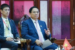 El primer ministro Pham Minh Chinh pronuncia su discurso en la reunión (Fuente: VNA) 