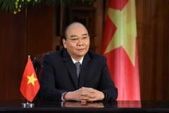 Premier vietnamita reitera importancia de mejorar capacidad de adaptación de comunidad al cambio climático