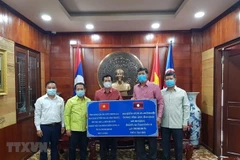 Provincias laosianas se unen a esfuerzos de Vietnam en lucha contra COVID-19