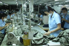 Respaldan a trabajadores afectados por COVID-19 en Ciudad Ho Chi Minh