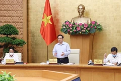 Gobierno de Vietnam analiza situación socioeconómica y respuesta al COVID-19 
