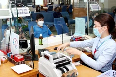 Bancos vietnamitas reducen tasas de interés a empresas afectadas por COVID-19