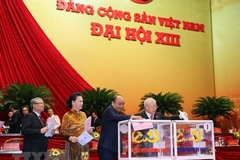 Felicita Laos a reelegido secretario general del Partido Comunista de Vietnam 
