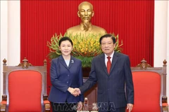 Dirigente vietnamita recibe a ministra de Justicia de China