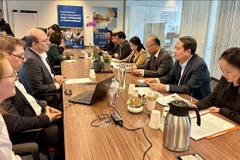 En la reunión. (Foto: VNA)