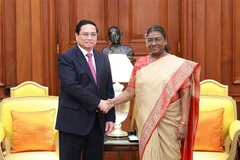 El primer ministro de Vietnam, Pham Minh Chinh, y la presidenta india, Droupadi Murmu. (Foto: VNA)