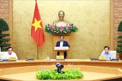 El primer ministro de Vietnam, Pham Minh Chinh, preside la cita. (Foto: VNA)