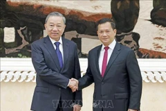 El presidente vietnamita To Lam (izquierda) y el primer ministro camboyano, Samdech Moha Bovor Thipadei Hun Manet. (Foto: VNA)