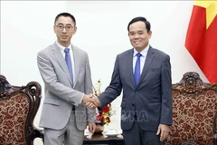 El viceprimer ministro Tran Luu Quang recibió hoy en Hanoi al vicepresidente de Huawei encargado de la región Asia-Pacífico, Zhengjun Zhang. (Fuente: VNA)