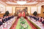 El encuentro entre el presidente vietnamita, Luong Cuong, y el secretario general del Partido Comunista y presidente de China, Xi Jinping. (Fuente: VNA)