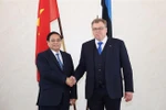 El primer ministro de Vietnam, Pham Minh Chinh, y el presidente de la Asamblea Estatal (Parlamento) de Estonia, Lauri Hussar. (Fuente: VNA)