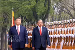 El secretario general del Partido Comunista de China y presidente del país, Xi Jinping, y el secretario general del Partido Comunista de Vietnam y presidente de la República, To Lam, en la ceremonia. (Fuente: VNA)