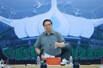 El primer ministro de Vietnam, Pham Minh Chinh, en la reunión con representantes de las fuerzas de construcción del Aeropuerto Internacional de Long Thanh. (Fuente: VNA)