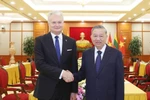 El secretario general del Partido Comunista de Vietnam, To Lam, y el presidente lituano, Gitanas Nausėda. (Fuente: VNA)