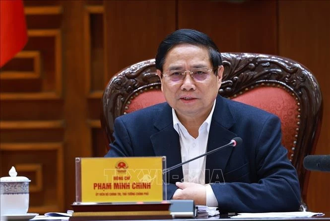 El primer ministro Pham Minh Chinh, secretario del Comité del Partido Comunista en el Gobierno, preside la reunión (Fuente: VNA) 