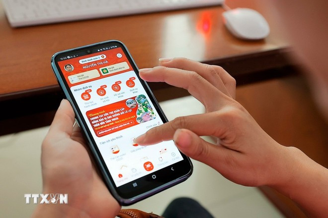 Instrucciones para registrarse y usar la aplicación VNeID. (Foto: VNA) huong-dan-nguoi-dan-huong-dan-nguoi-dan-dang-ky-su-dung-ung-dung-vneid-anh-ttxvn.jpg