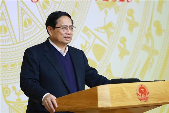 El primer ministro Pham Minh Chinh habla en la reunión. (Foto: VNA) chong-lang-phi.jpg