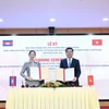 El ministro de Industria y Comercio de Vietnam, Nguyen Hong Dien y la ministra de Comercio de Camboya, Cham Nimul (Fuente: VNA)