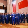 El primer ministro Pham Minh Chinh y la delegación vietnamita visitan la Bolsa de Valores de Shanghái (SSE) y el Centro Financiero Internacional de Shanghái (IFC) (Foto: VNA)