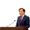El ministro y portavoz del Gobierno, Tran Van Son, habla en la cita (Fuente: VNA)