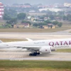 Un avión de Qatar Airways en el Aeropuerto Internacional de Noi Bai. (Foto: VNA)