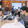 Los residentes del barrio de Binh Quoi reciben chequeos médicos gratuitos. (Foto: VNA)