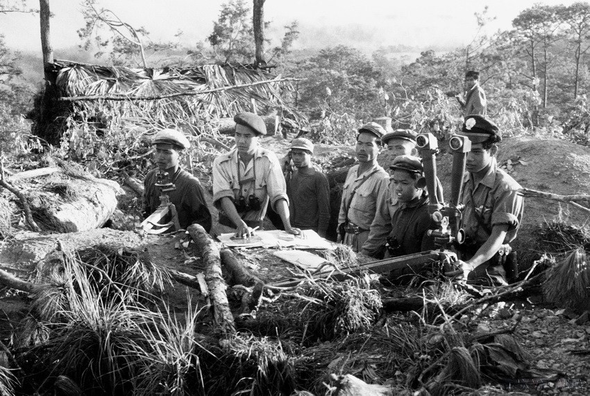 Expertos militares vietnamitas y soldados laosianos. (Foto: Archivo de VNA)