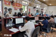 El Centro de Servicios Administrativos Públicos de la comuna Tua Sin Chai, en la provincia de Lai Chau, se ha convertido rápidamente en un punto de referencia cercano y habitual para los residentes locales cada vez que necesitan realizar trámites administrativos. (Foto: VNA)