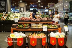 Productos vietnamitas exhibidos en la entrada de un supermercado de AEON en Malasia. (Foto: VNA)